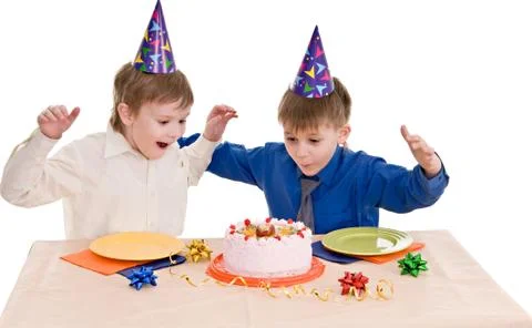 Two boy with cake Stock Photos