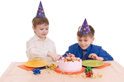 Two boy with cake Stock Photos