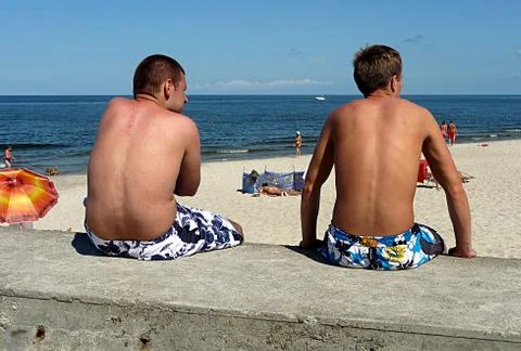 Two boys at the beach Stock Photos