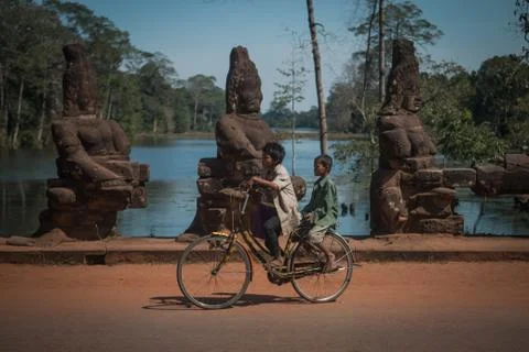 Two boys on a bicycle Stockfoto's