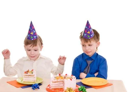 Two boys with cake Stock Photos