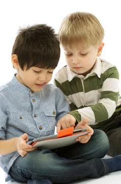 Two Boys with Digital Tablet PC Stock Photos