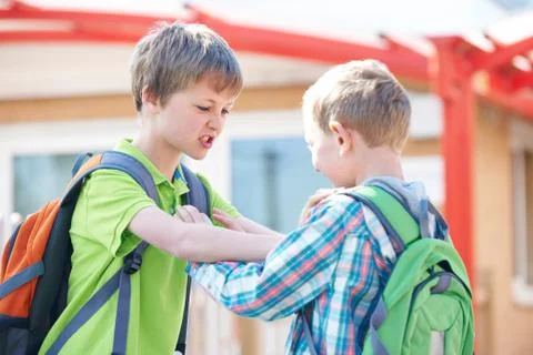 Two Boys Fighting In School Playground Stock Photos