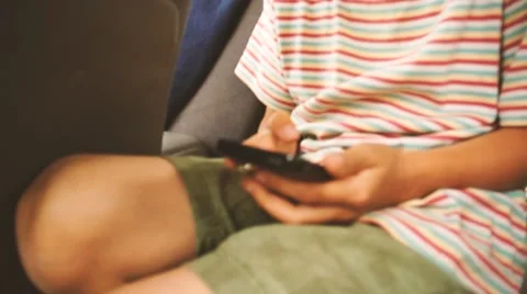 Two boys gaming on smartphone Stock Footage 61968234