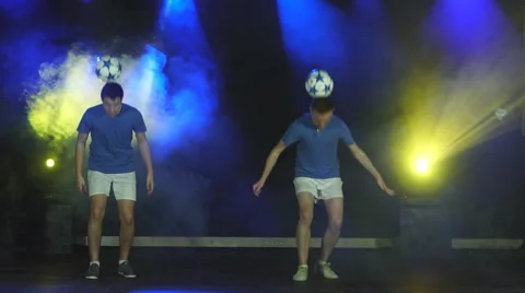 Two boys juggling ball Stock Footage 67996680