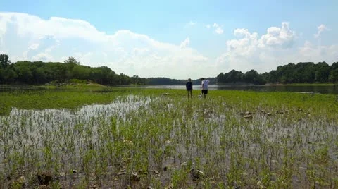 Two Boys Lake Spring 1 HD Kids Water Fun Stock Footage 12528448