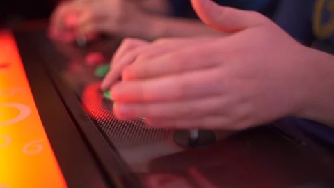 Two boys playing a fighting game Stock Footage 124263814