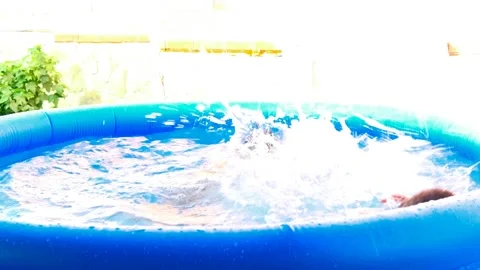 Two boys playing in the pool Видео 145922669