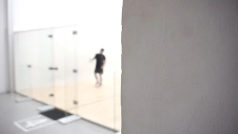 Two boys playing squash Stock Footage 121745227