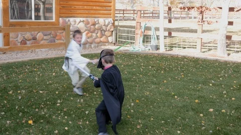 Two boys playing star wars Video stock 90578278