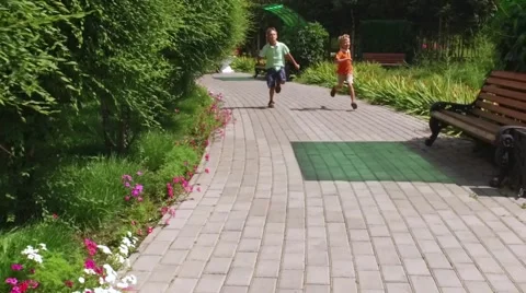Two boys running in the park Video stock 68175759