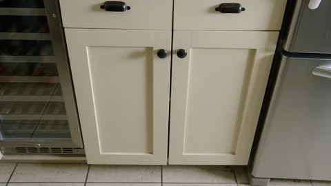 Two boys taking candy from candy drawers Stock Footage 127957843