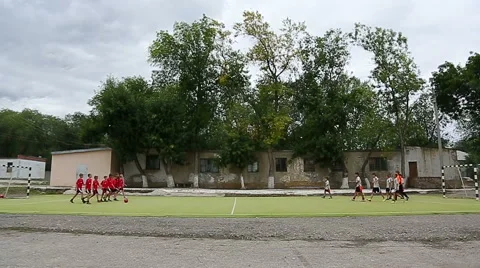Two boys team players on the field Stock Footage 40471694