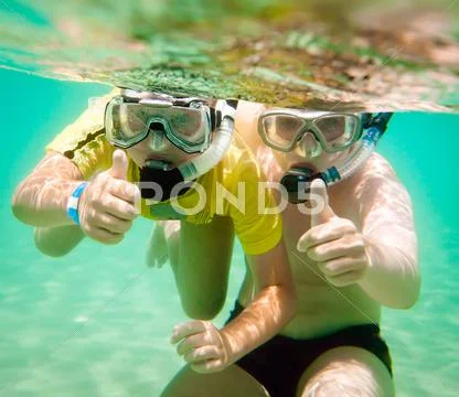 Two boys underwater Stock Photos