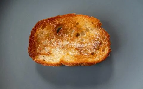Two bread slices with sugar for breakfast Stock Photos