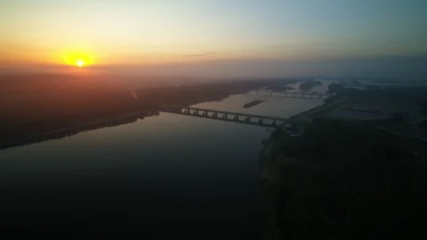 Two bridges across the river at sunset Stock Footage 119258768