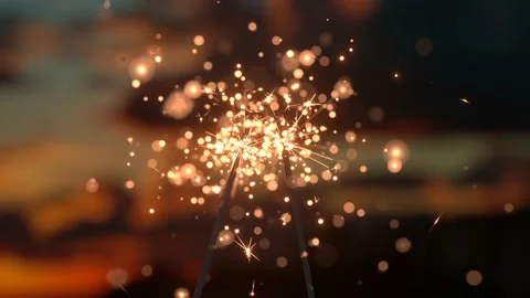 Two bright bengal lights burn on the sunset background close-up 3d 4k animation Stock Footage 195173752
