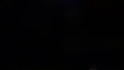 Two bright blinking blurry lights Video stock 75359516