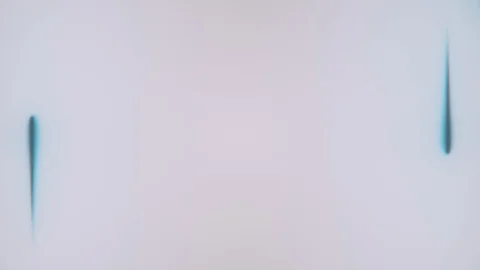 Two bright blue neon lighting lines are moving on white background and forming Stock Footage 129283254