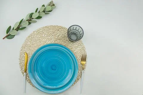 Two bright blue serving plates with a spiral pattern of different sizes, stand Stock Photos