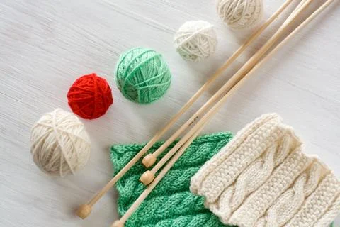 Two bright patterns, yarn balls and needles Stock Photos