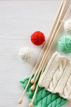 Two bright patterns, yarn balls and needles for knitting Stock Photos