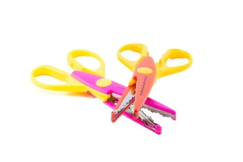Two Brightly Colored Craft Pattern Scissors. 스톡 사진