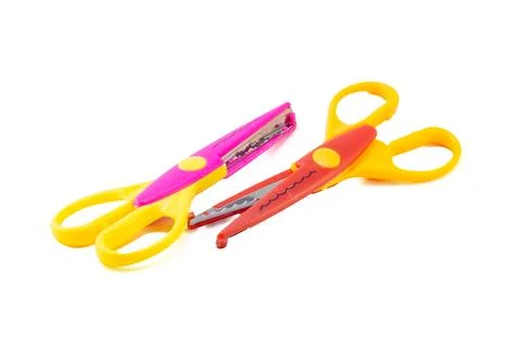 Two Brightly Colored Craft Pattern Scissors. 스톡 사진