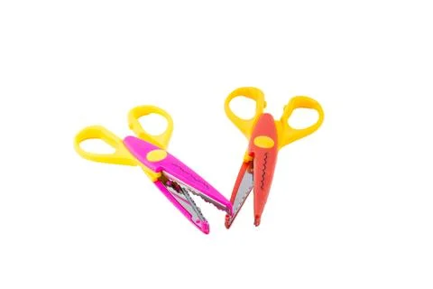 Two Brightly Colored Craft Pattern Scissors. 스톡 사진