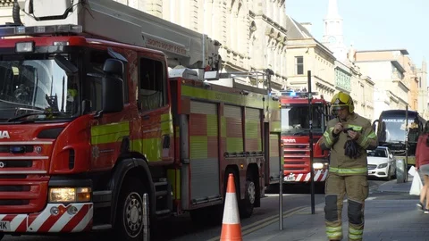 Two British Fire Trucks On Locations With Firefighters During Emergency Stock Footage 119146279