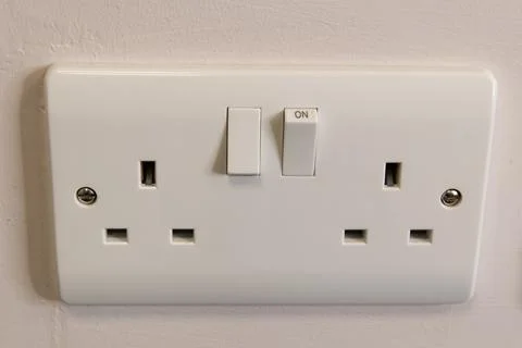Two British white power sockets G type of socket Stock Photos