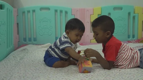 Two brother play in room Stock Footage 101411749