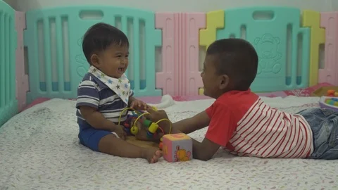 Two brother play in room Stock Footage 101411861