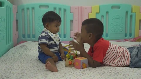 Two brother play in room Stock Footage 101412195