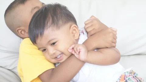 Two brother play in room Stock Footage 101420637