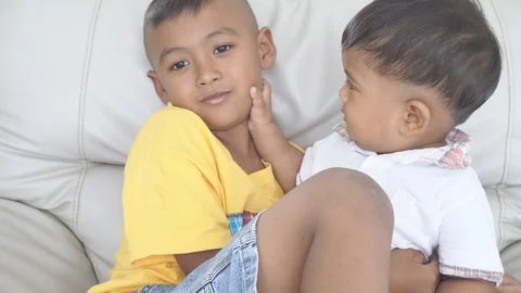 Two brother play in room Stock Footage 101420817