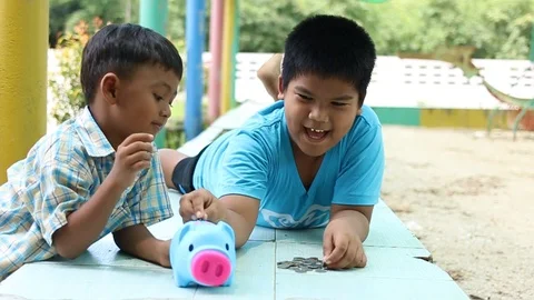 Two brother save money Stock Footage 90964707