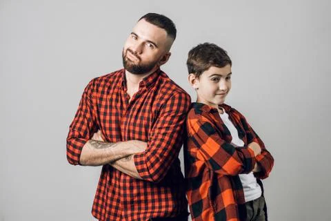 Two brothers with sceptic look posing to the camera Stock Photos