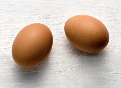 Two brown chicken eggs, healthy source of proteins Foto stock