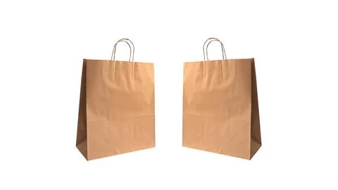Two brown craft paper bags with handles isolated on a white background Foto stock
