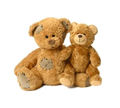 Two brown cute teddy bears on a white background two brown cute teddy bear... Foto stock