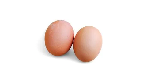 Two Brown Eggs Isolated on White Background Closeup Minimal Food Concept Stock Photos