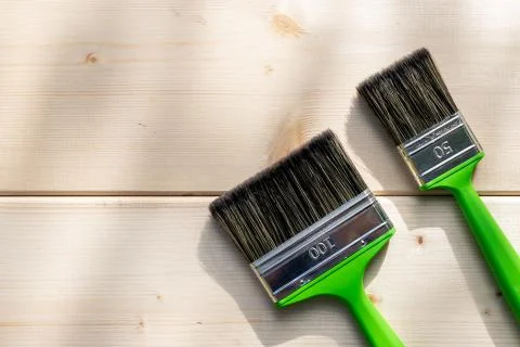 Two brushes, decorating and house renovation tools .painter and decorator Stock Photos