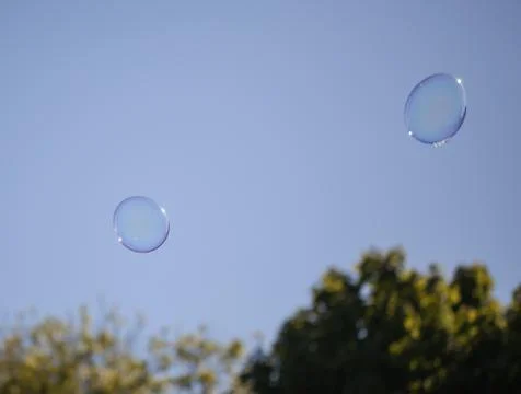 Two bubbles floating bubbles floating in sky Stock Photos