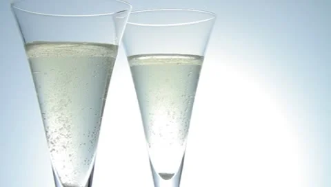 Two bubbling champagne Stock Footage 8908555