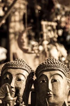 Two buddha heads in sepia Stock Photos