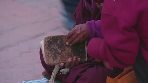 Two Buddhist monk interacting with each other Stock Footage 77453686