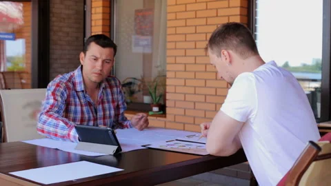 Two builder engineers have signed a contract and say goodbye Stock Footage 98277252