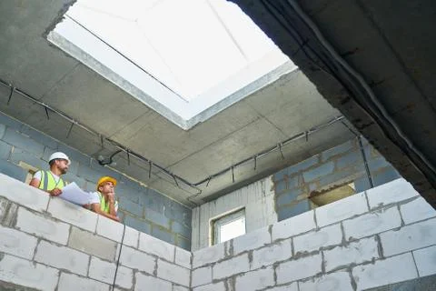 Two Builders on Construction Site 写真素材