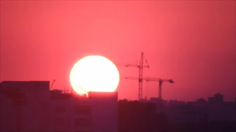 Two building cranes in sunrise Stock Footage 49659868